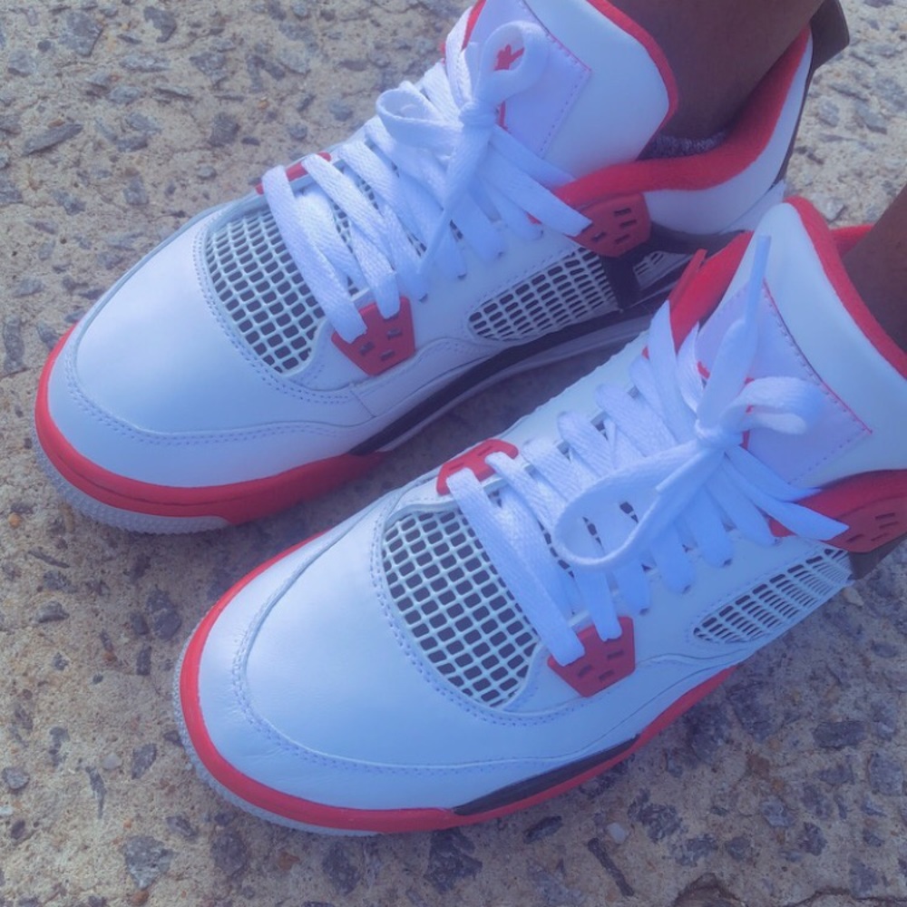 White black and red Jordan retro 4s
